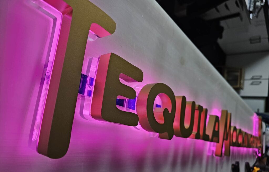 25MM WET COATED GOLD 3D LETTERS WITH PINK HALO ILLUMINATION - WORKSHOP in London