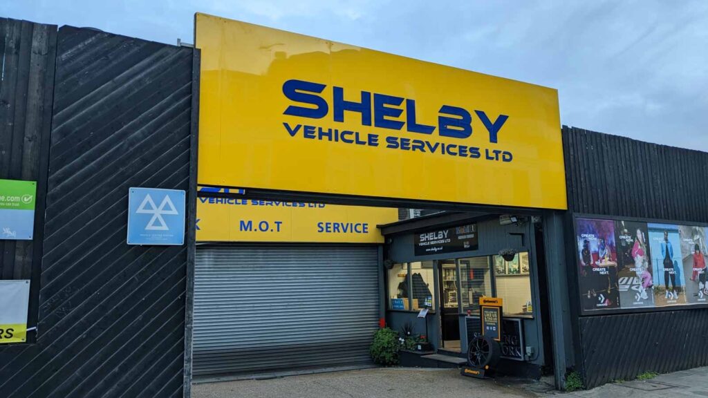 WET COATED 5MM ACRYLIC LETTERS APPLIED TO YELLOW ALUMINIUM COMPOSITE PANEL in London