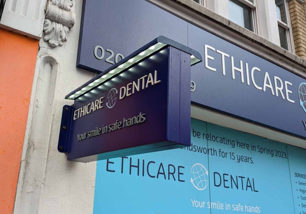 POWDER COATED ALUMINIUM PROJECTING SIGN WITH 5MM WE COATED LETTERS AND DOWN-LIGHTER in London