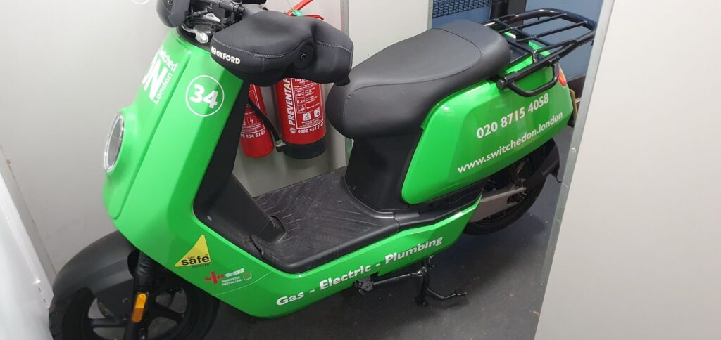 FULL COLOUR PRINTED VINYL AND CUT WHITE VINYL SCOOTER GRAPHICS in London