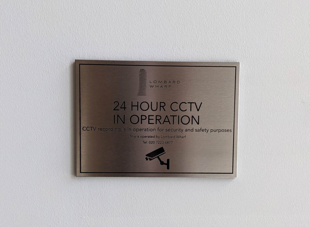 BLACK FILLED ETCHED STAINLESS STEEL PLAQUE in London