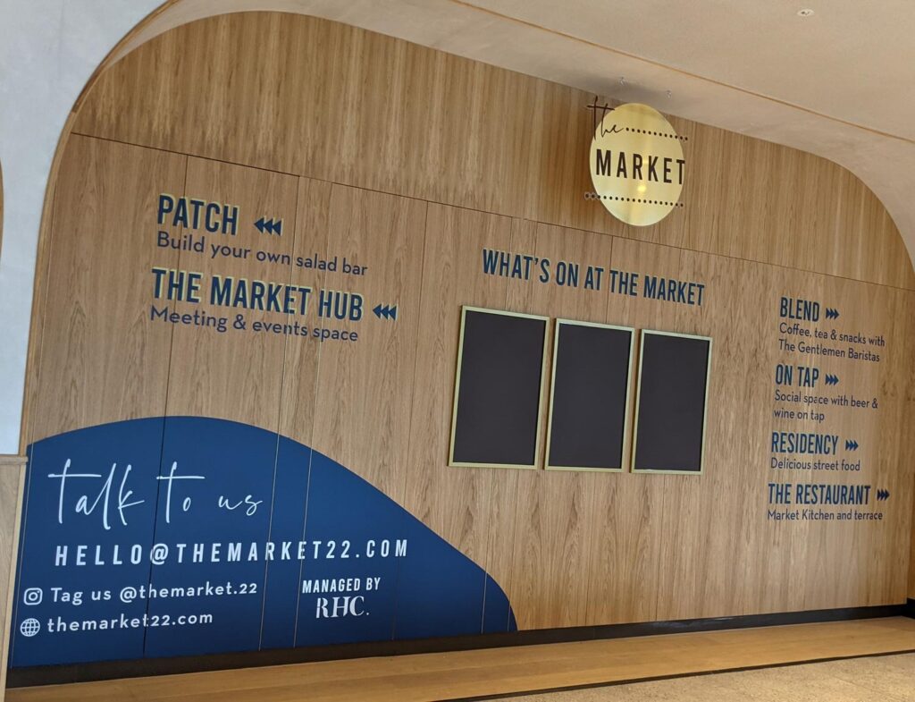 Cut Vinyl Letters & Suspended Clear Acrylic Roundel in London